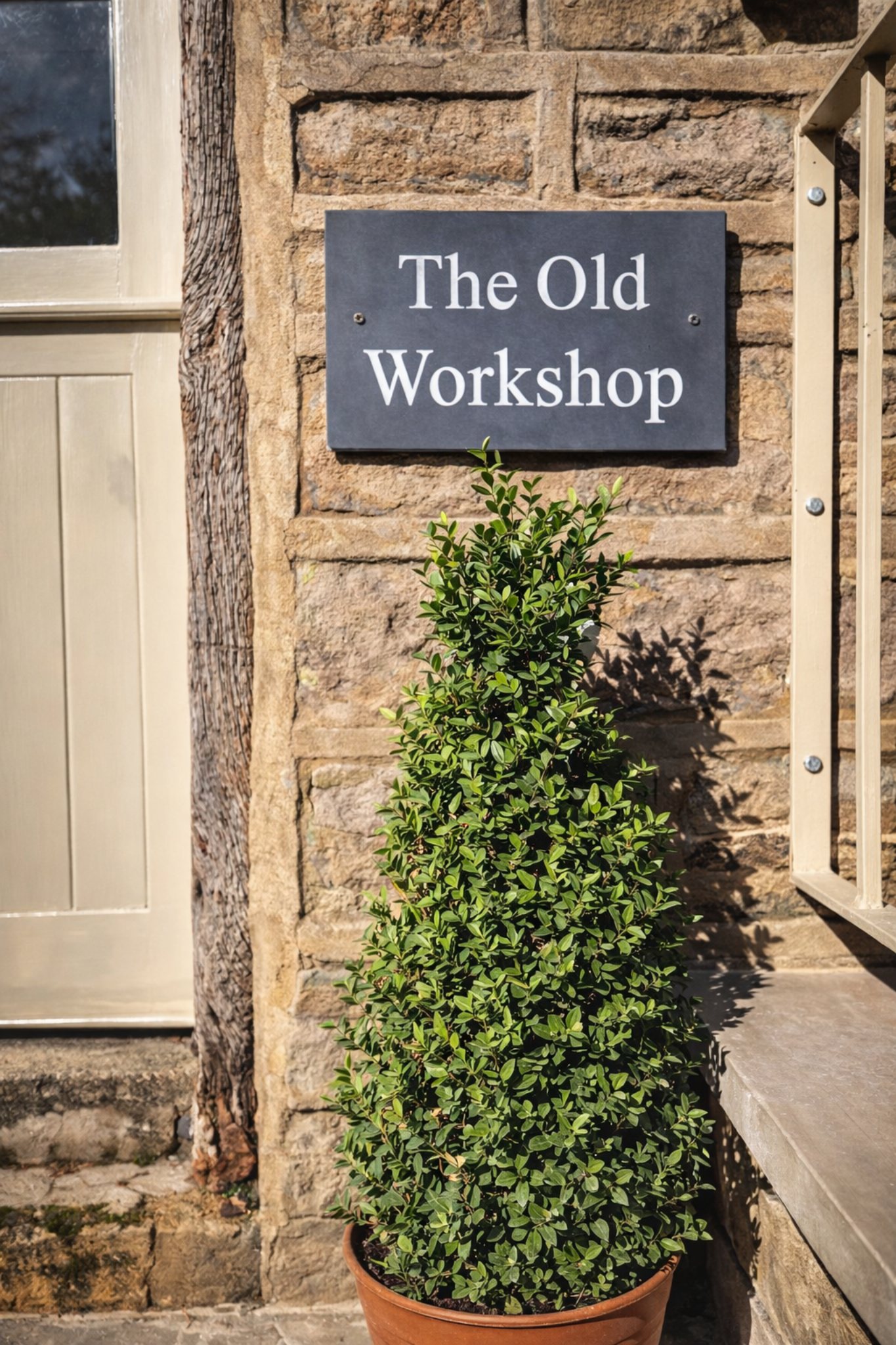 The Old Workshop entrance in sunlight